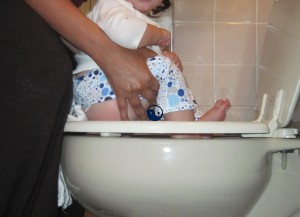 Drop the prefold from the front, let it hang from the back, and the potty opp is still easy pee-zy.
